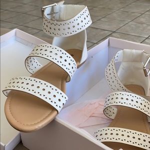 White sandals never worn.